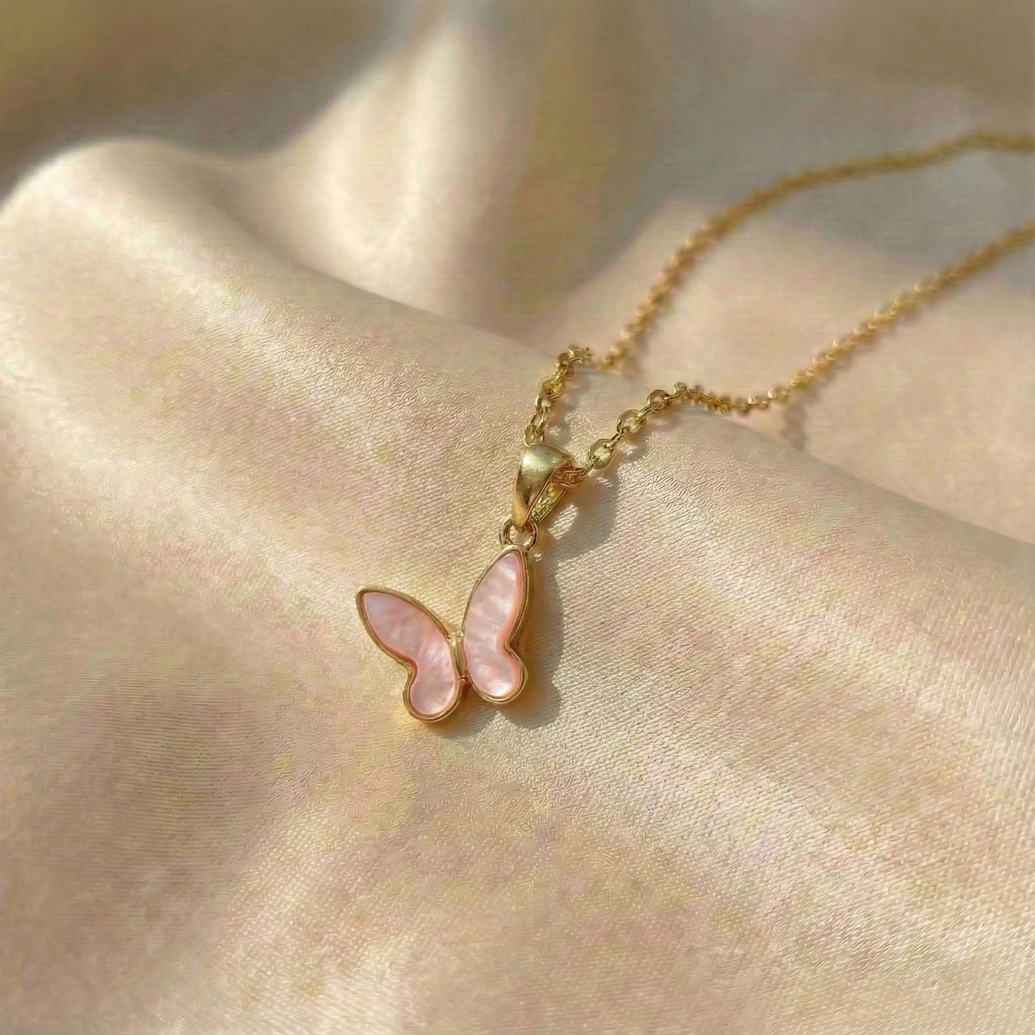 Rosewing Butterfly Charm